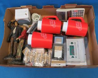 Lot 178. Programmable thermostat, cowboy/cowgirl figurines, and more