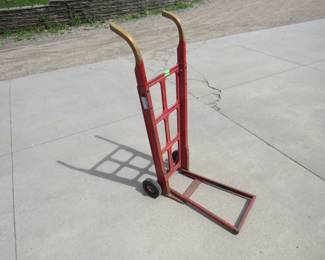 Lot 246. Dolly with solid wheels and a long foldable base