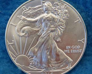 Lot 393. 2014 American Silver Eagle.&nbsp; One ounce of .999 fine silver.
