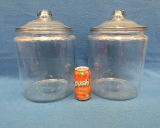 Lot 184. Two glass containers with lids.&nbsp; Good condition. 10 1/2" x 9"