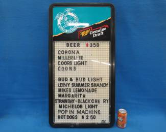 Lot 214. Miller Genuine Draft sign board.&nbsp; Slight damage.  35" x 18" x 2"