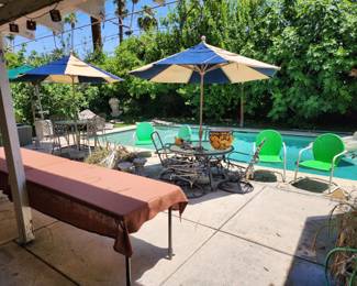 Umbrellas and stands, patio tables and chairs.  Set of 4 retro metal lawn chairs in kelly green and white—so cute!!