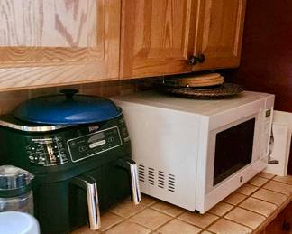 Tons of small appliances. Microwave, air fryer, toaster oven, rice cooker, toaster, blenders, juicers, etc
