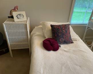 White wicker four-drawer, nightstand, twin bed