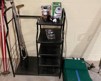 Golf sports rack, practice mat, and clubs