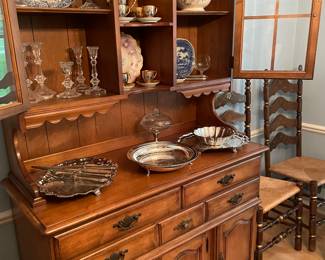 Sideboard with hutch, Crystal candlesticks, English, China, and 24 karat plated tea set , and Silver-plated SERVICE pieces