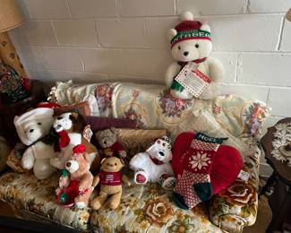 Holiday Christmas bears and other stuffed animals sitting on a vintage in great shape floral couch