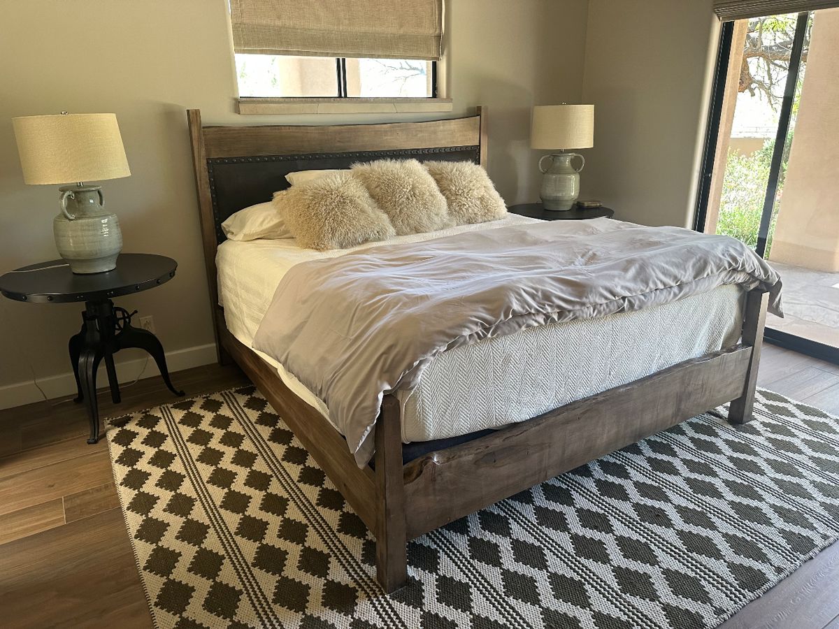 Guest room : 1.Leather and wood King Size Bed ( mattress not available) 2. 8x10 handwoven area rug gray and cream 3. Arhaus crank end tables  4. Turquoise Lamps with Cream Shades