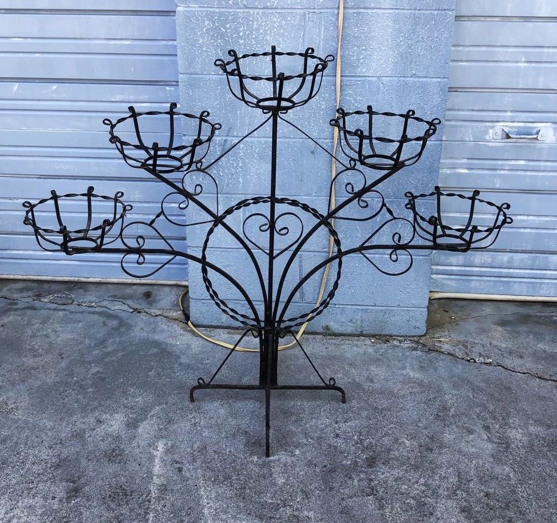 Beautiful 5-Tier Architectural Iron Plant Stand has a Pennsylvania Dutch theme I think, with the hearts.