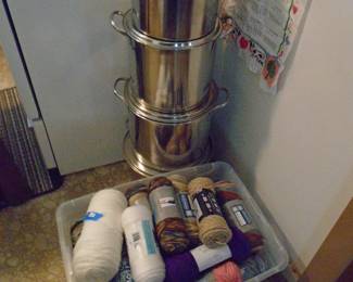 The bonanza of new skeins of yarn. Plus look at the stack of Crock Pots with Lids from big, to bigger, to bigger again and then on the bottom, the biggest.