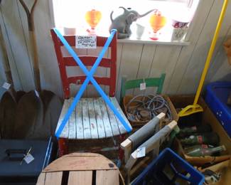 Note the 32 oz soda bottles. Several are coke brand and others. The blue box to the bottom right is a crate made to hold 6 of the 32-oz soda bottles. (Sold separately)