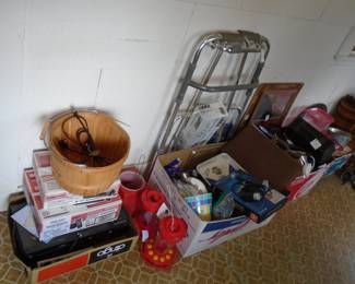 Lots of humming bird feeders, Analog TV gear, Womens gardening sun visors in many different colors, and several of the little jug coolers to carry water.