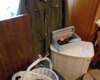 Old Wicker Hamper.. Guys look this one up "Bower Coon Coat". It is very collectible. Lots of various baskets through the house.