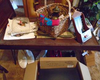 This is such a unique coffee table. Also some very old baskets, an ornate Brass teapot which we have the matching sugar and creamer to.