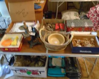 Note the unique sausage grinder with meat pusher. Also Acrylic grapes with matching candlestick holders, a great centerpiece.  A piece of Robinson Ransbottom Pottery, and Pyrex Portables under the table.