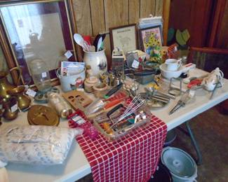 Kitchen  stuff including 3 crock pots.  Kitchen gadgets and tools too.
