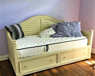 The bed had storage and a Beauty Rest mattress!