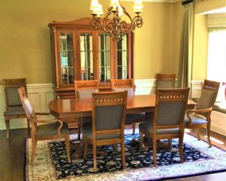 A coordinating  Lexington dining room table, 8 chairs and a china cabinet.  