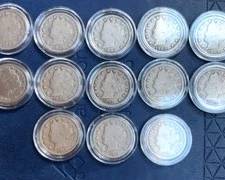 A collection of coins continuous dates