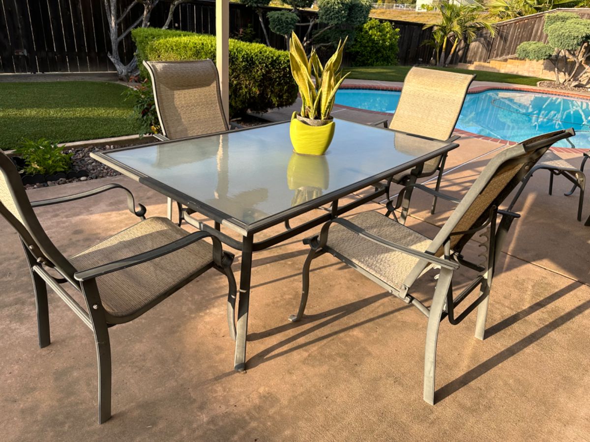 Patio table has four chairs  with matching pieces available