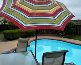 Tilting umbrella needs quick wipe down but great condition