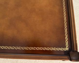 Leather in pristine condition, has ledge to put glass top over to protect if wanted