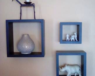 Metal reindeer, tea holder
Vintage bud vase
3 miniature dogs
Soapstone rhino three square 3-D shelves