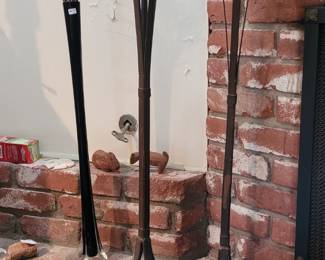 Tall wrought iron candel holders an stretch glass vase 