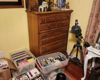 chest of drawers, telescope and records
