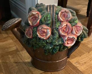 cast iron watering can door stop