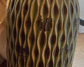 tall green corregated vase