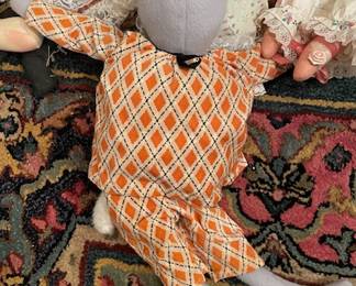gray soft bunny with orange diamond suit