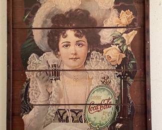 Coca Cola lady print on wooden panel