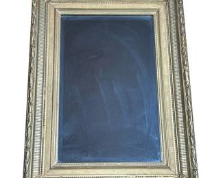 BEVELED GLASS MIRROR IN GILT FRAME | Beveled glass mirror in formed gilt frame. - l. 22.75 x w. 3.5 x h. 31 in
