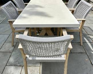 Beautiful outdoor Dining Table and 6 Chairs by Outdoor Interiors and purchased at Wannemaker's in Downers Grove.  The Wood is Teak and the chairs have a Rope Style Netting.  