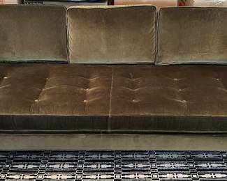 This chocolate brown velvet sofa with 1 single cushion  is from Room and Board 