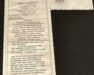 Tufted Leather Ottoman with Metal Frame from World Market.