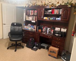 On top of this beautiful Cherry Desk and matching Bookshelf you will find a HP Photosmart Plus copy/ printer/ scanner, Epson scanner, Bose Model 100 Speakers, Paper Shredder, Sentry Safe, Office Supplies, CGI & Iron Mountain Solutions company swag.