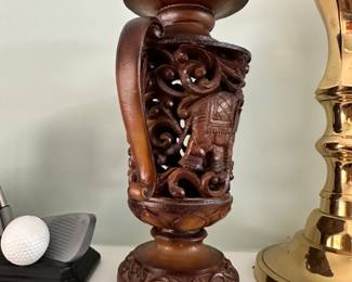 carved wooden candle stick