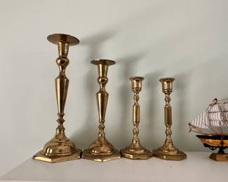 graduating brass candle sticks