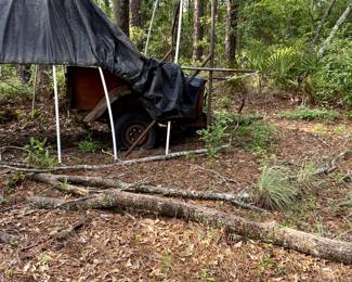 Homemade trailer from a small Ford truck.  We found the original Ford tailgate and tag too!  