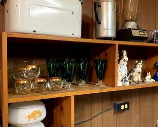 What???  Never know what you are going to uncover at the bottom of a wood shop.  Tetley Tea glasses!