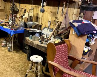 Very old butcher block table.  In rough condition but could be restored.  Covered with many unique collectible items.  Check out those light fixtures on the shelves above!