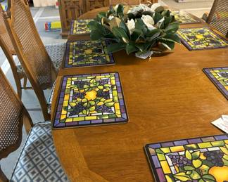 Table and cane back chairs.