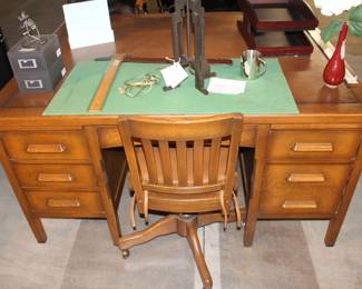 Large amount of desks and office chairs are available for purchase.