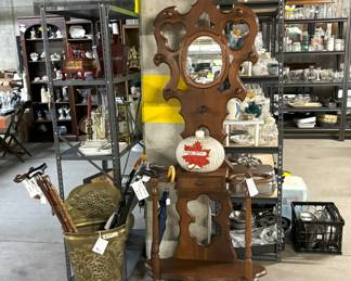 You will find many unique items at the sale like  hall trees and umbrella stands. 