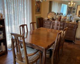 This is the fine dining table and six matching chairs in the sale.