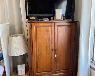 If you need an armoire, this is a really good choice. Of course, the TV could also be yours, or the lamp, or the small stand.