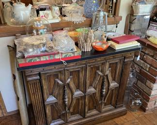 If you look carefully, you ca see a kerosene lamp on the top of this cabinet. Come see the rest of the items shown here.