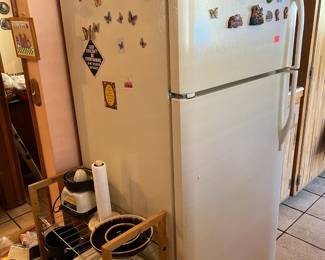 Yes, here we have a refrigerator and a small shelf unit.